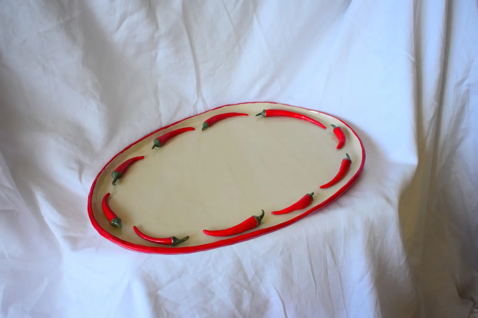'Hot stuff platter’ by Kooked Ceramics
