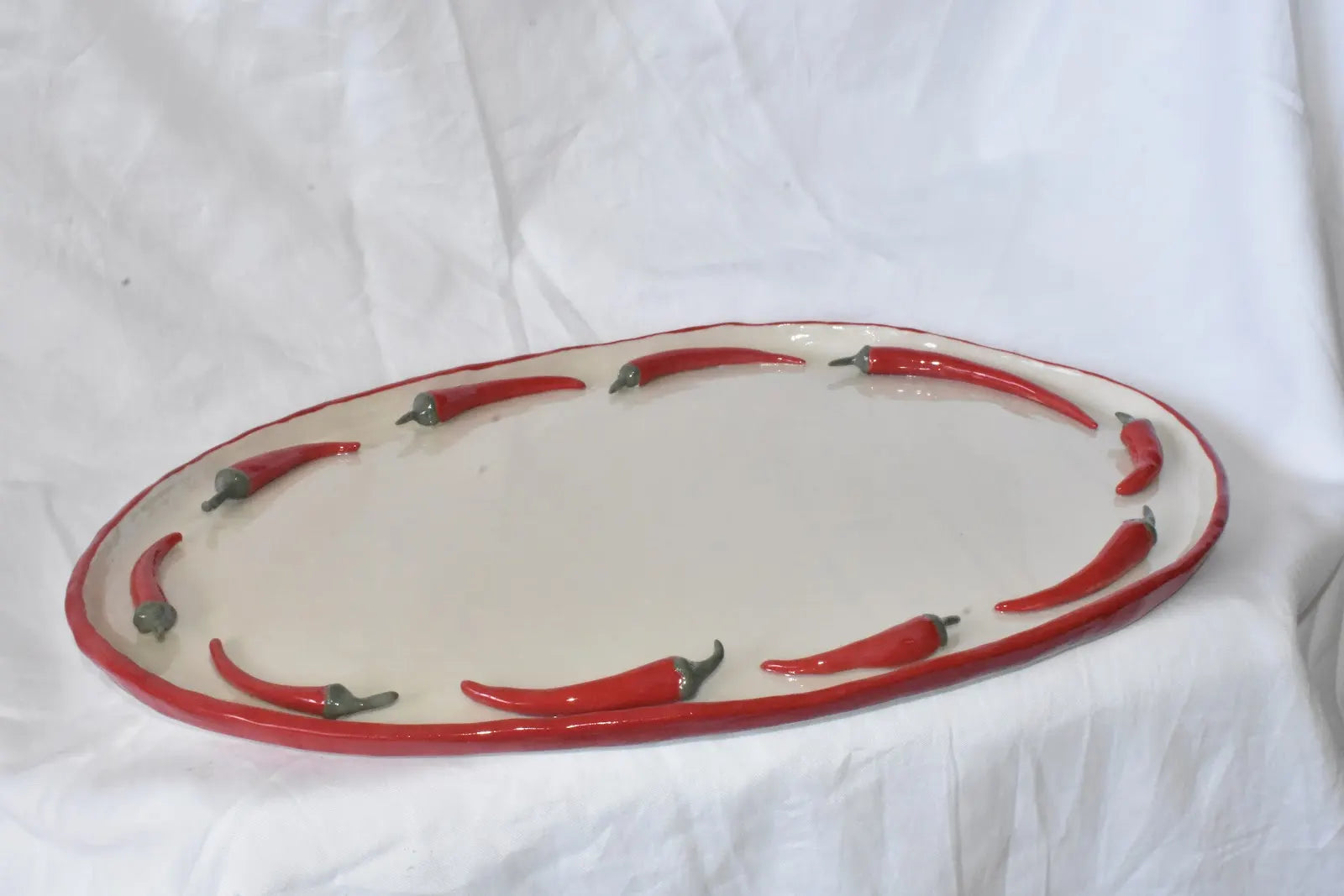 'Hot stuff platter’ by Kooked Ceramics