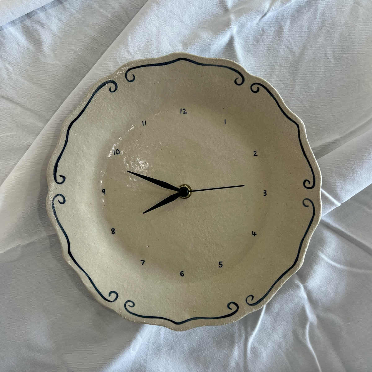 'Ceramic Clock II' by Jasmine Raisbeck