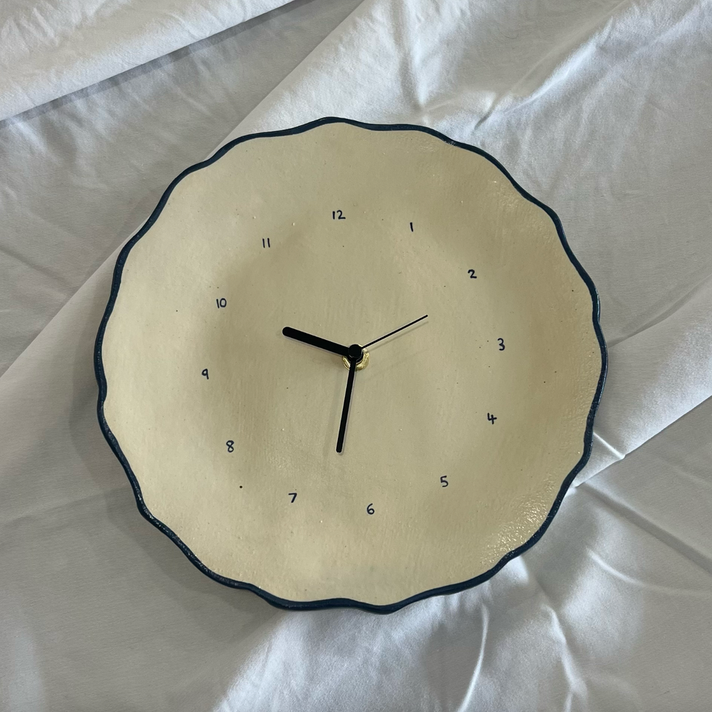 'Ceramic Clock I' by Jasmine Raisbeck